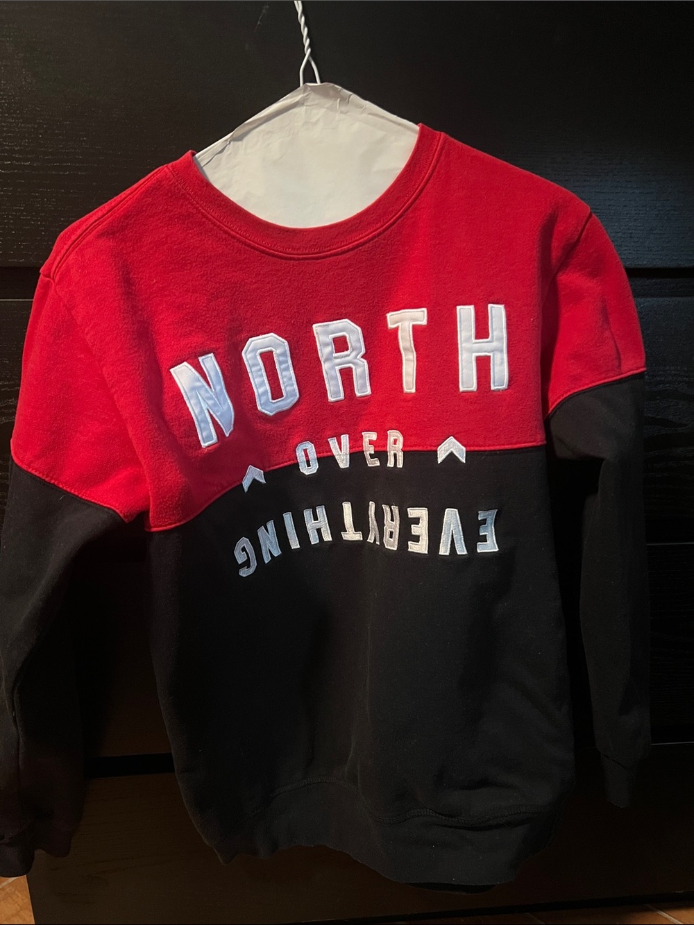 Raptors Crew Neck Sweatshirt. Mitchell & Ness Red and Black Colorblock Crewneck